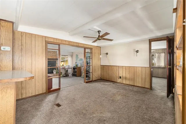 a view of a hallway with closet area