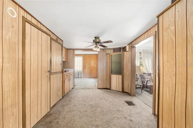 a view of an empty room and window