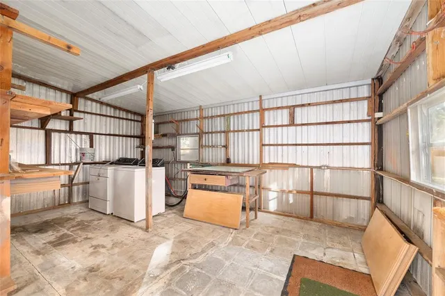 an aerial view of mountain with trees all around