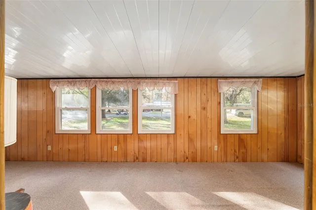 a kitchen with stainless steel appliances a stove microwave and cabinets