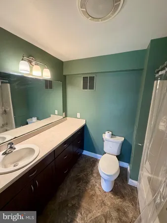 a bathroom with a sink and a toilet
