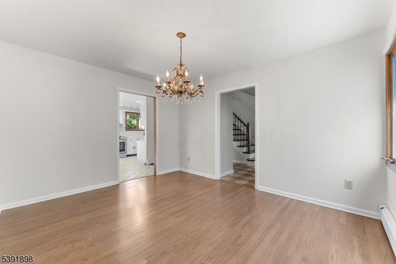 59 Cherryville Stanton Road Flemington, NJ 08822 - Photo 13 of 31 a view of an empty room with wooden floor