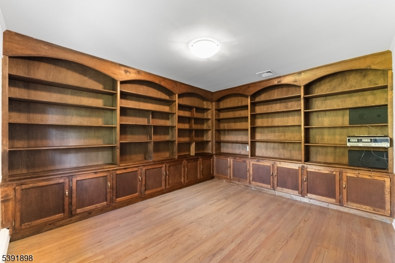 59 Cherryville Stanton Road Flemington, NJ 08822 - Photo 21 of 31 a room with walk in closet and wooden floor