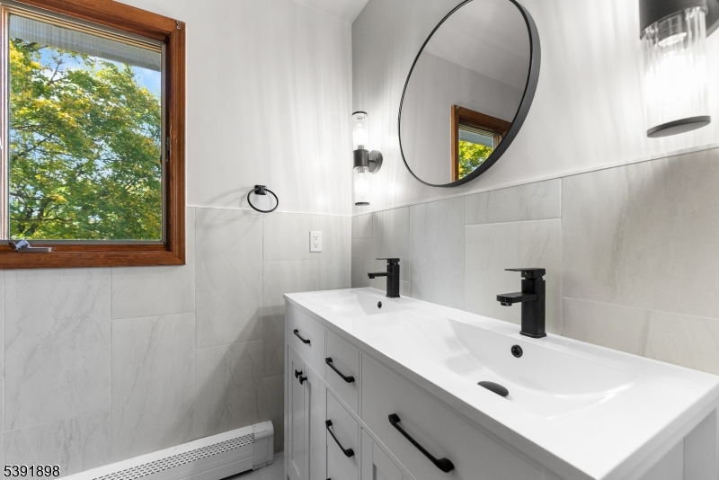 59 Cherryville Stanton Road Flemington, NJ 08822 - Photo 22 of 31 a bathroom with a sink and a mirror