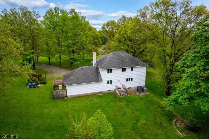59 Cherryville Stanton Road Flemington, NJ 08822 - Photo 4 of 31 a house view with a sitting space garden