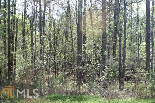 2620 Tucker Mill Road Southwest Conyers, GA 30094 - Photo 1 of 1 a view of a forest that has large trees