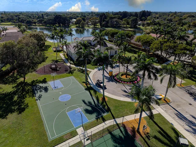 an aerial view of a house having yard