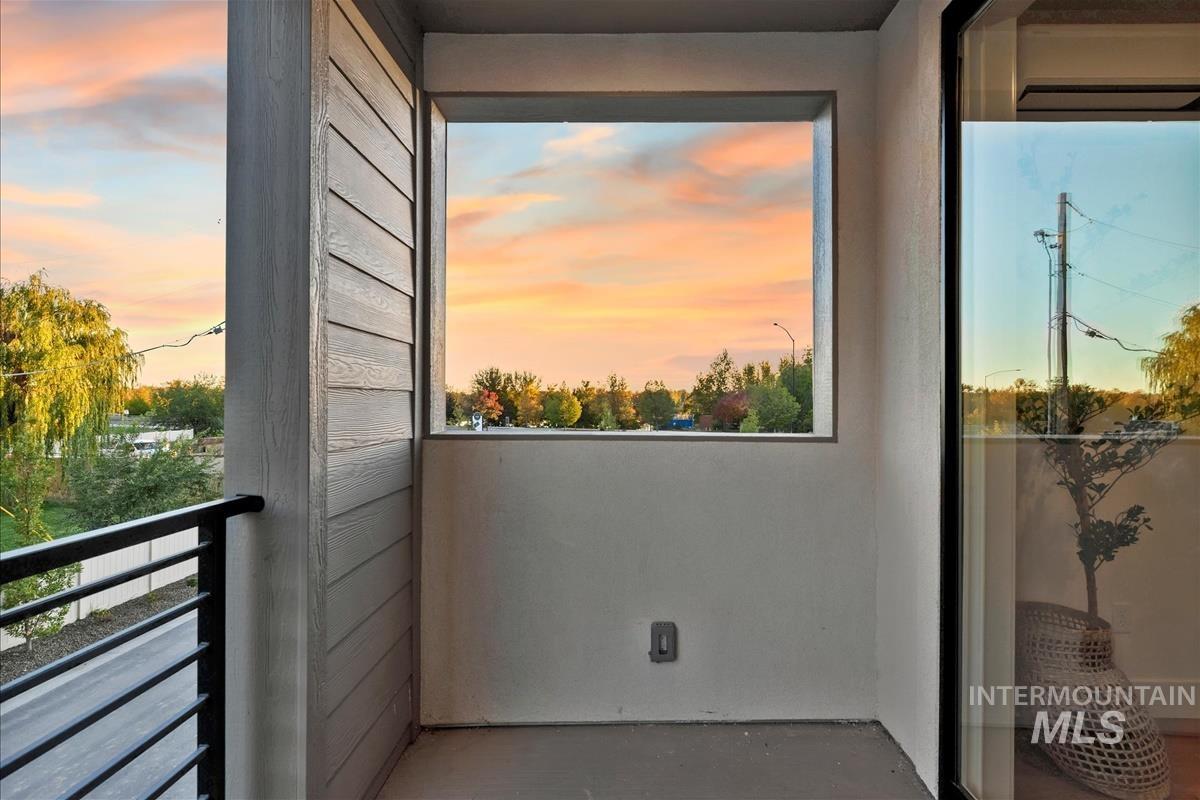 3243 West Moore Street Boise, ID 83702 - Photo 27 of 38 View of balcony at dusk