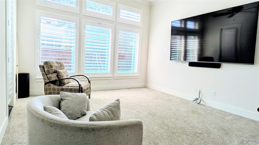 8933 Frostweed Road Frisco, TX 75035 - Photo 19 of 36 a living room with furniture and a window