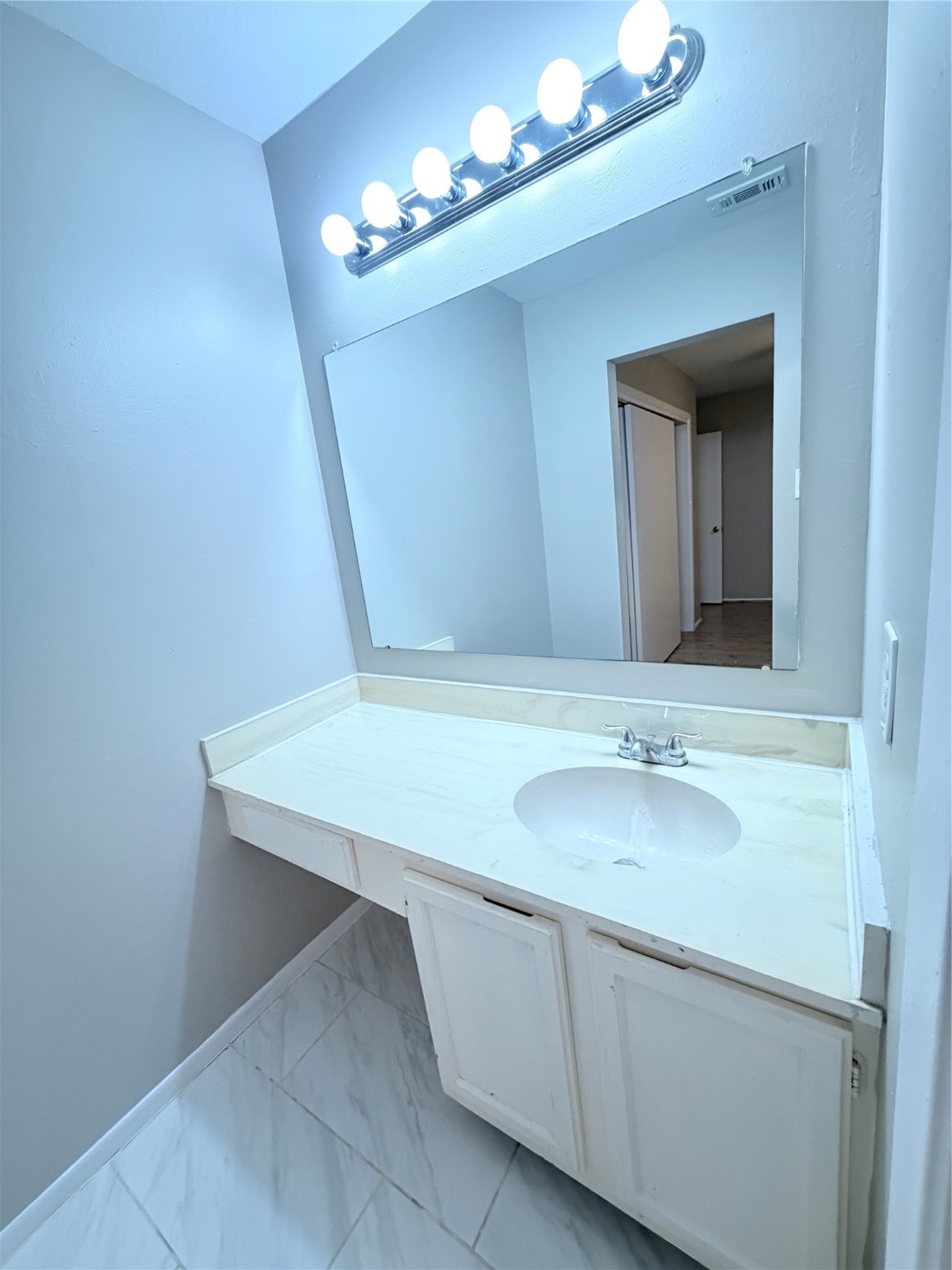 12847 Briarwest Circle Houston, TX 77077 - Photo 16 of 21 a bathroom with a sink and a mirror