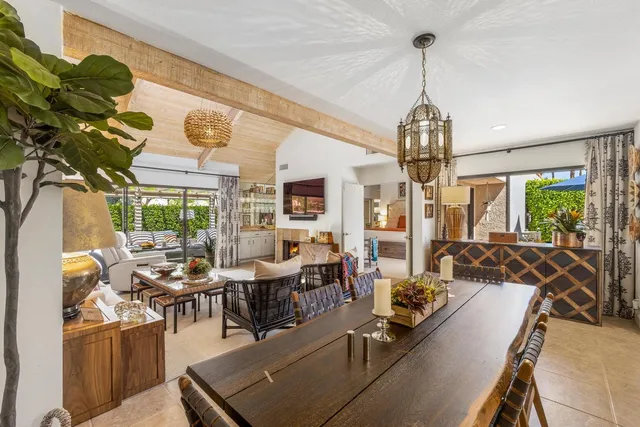 a kitchen with stainless steel appliances white cabinets and a refrigerator