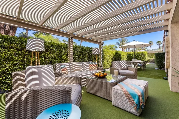 a outdoor living space with furniture and garden