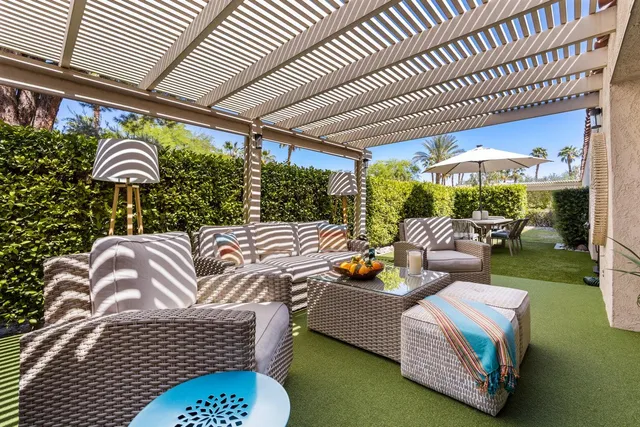 a outdoor living space with furniture and garden