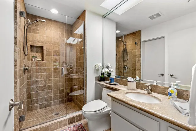 a view of a house with swimming pool and sitting area