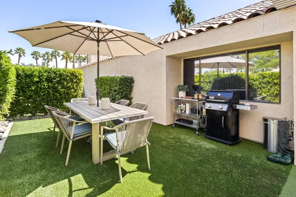 a table and chairs in the patio