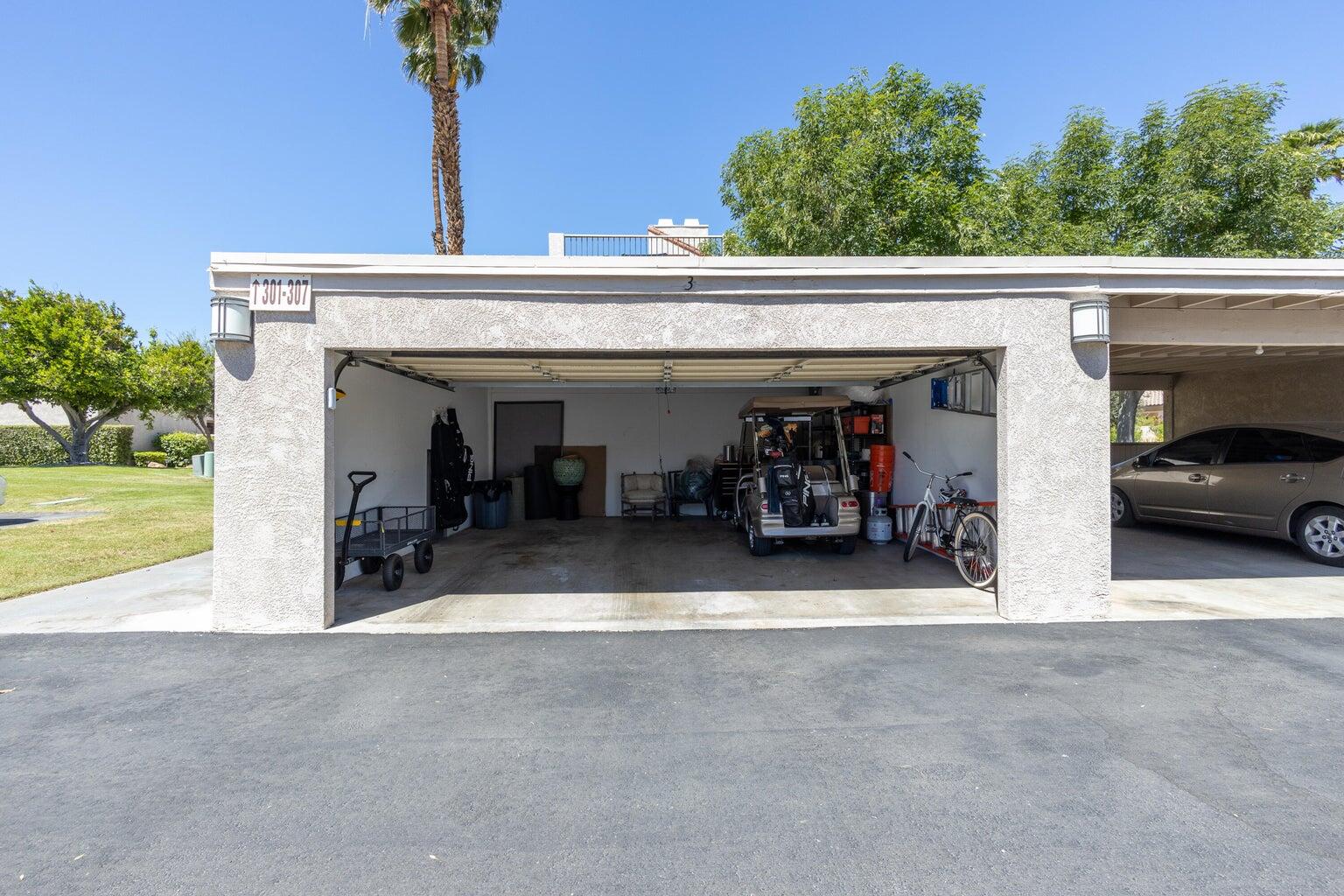 303 Forest Hills Drive Rancho Mirage, CA 92270 - Photo 63 of 71 a view of a car garage