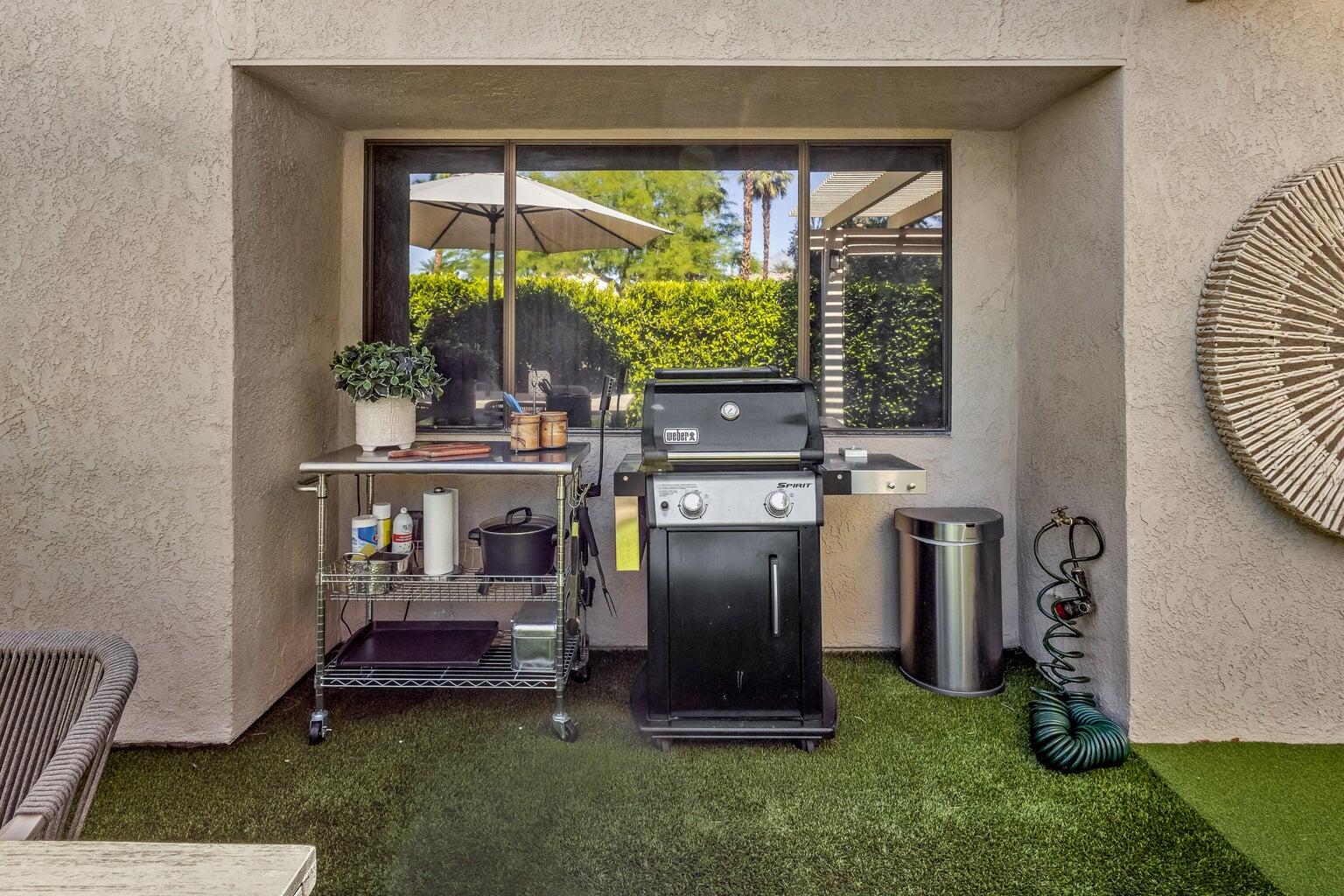 303 Forest Hills Drive Rancho Mirage, CA 92270 - Photo 8 of 71 a kitchen with stainless steel appliances granite countertop a stove a refrigerator and a chair