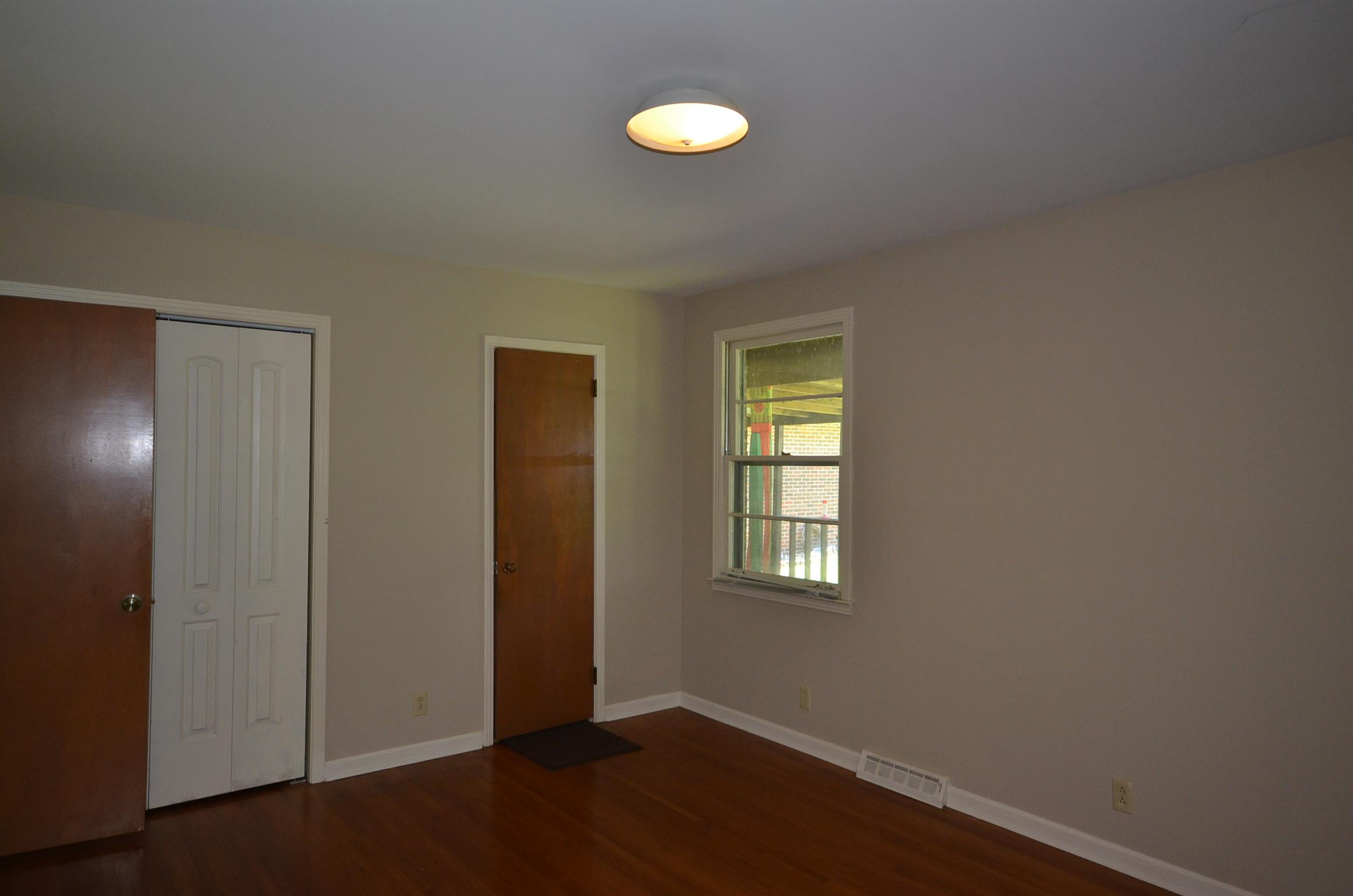 310 Kimbrough Road Clarksville, TN 37043 - Photo 13 of 25 a view of a room with window and wooden floor