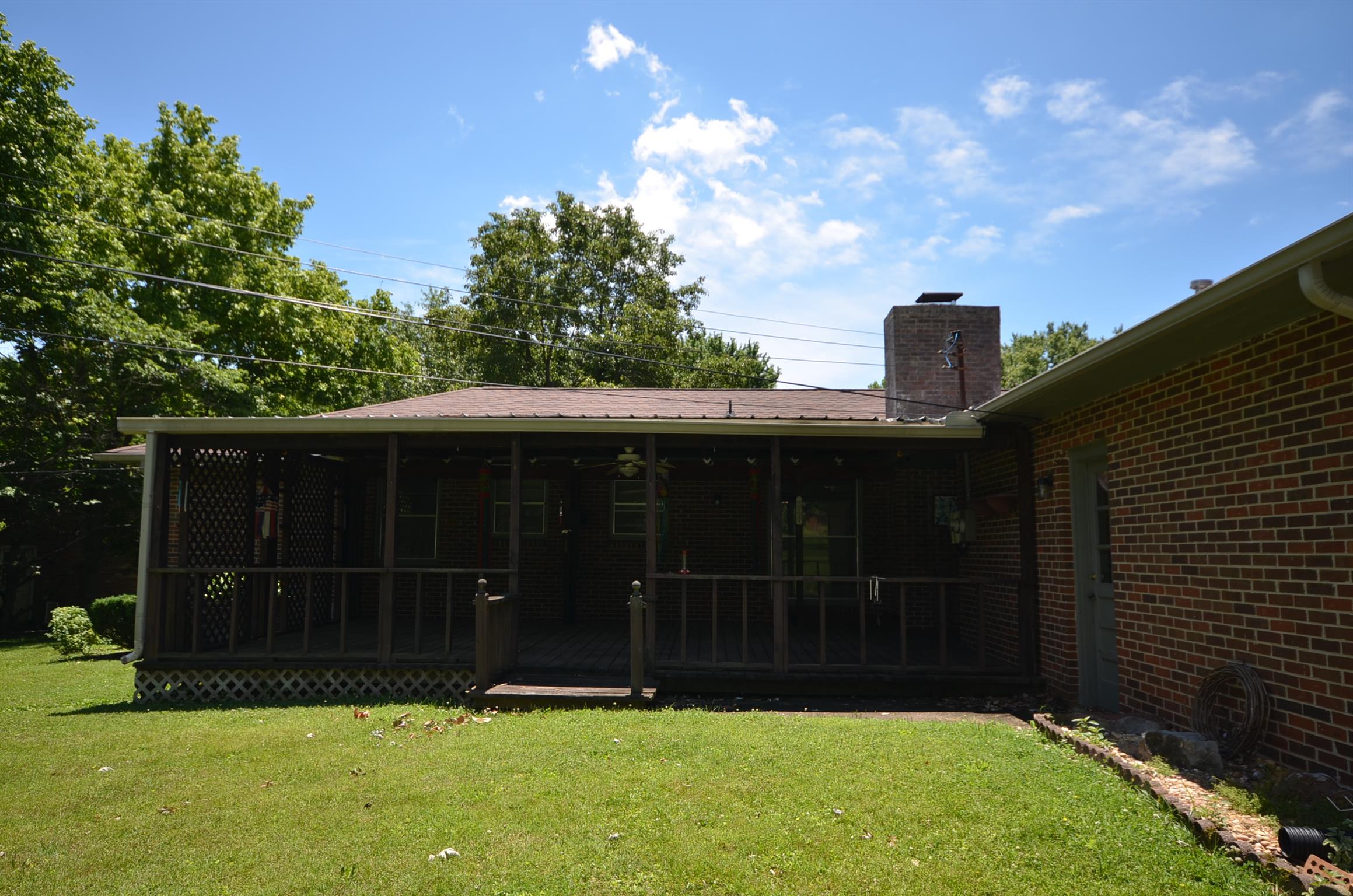 310 Kimbrough Road Clarksville, TN 37043 - Photo 22 of 25 a view of house with backyard space and garden