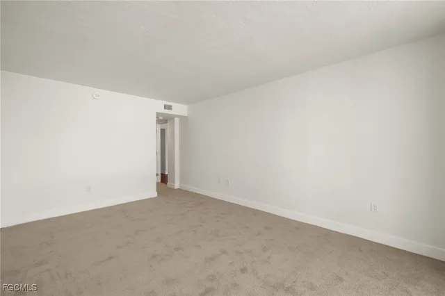 an empty room with window