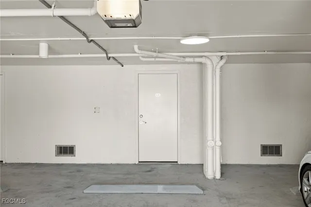 a view of an house with backyard porch and garden