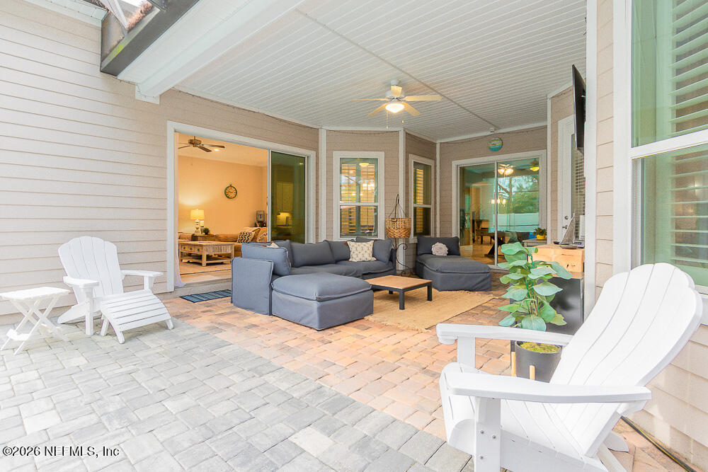 191 Enrede Lane St. Augustine, FL 32095 - Photo 37 of 44 a living room with furniture and a large window