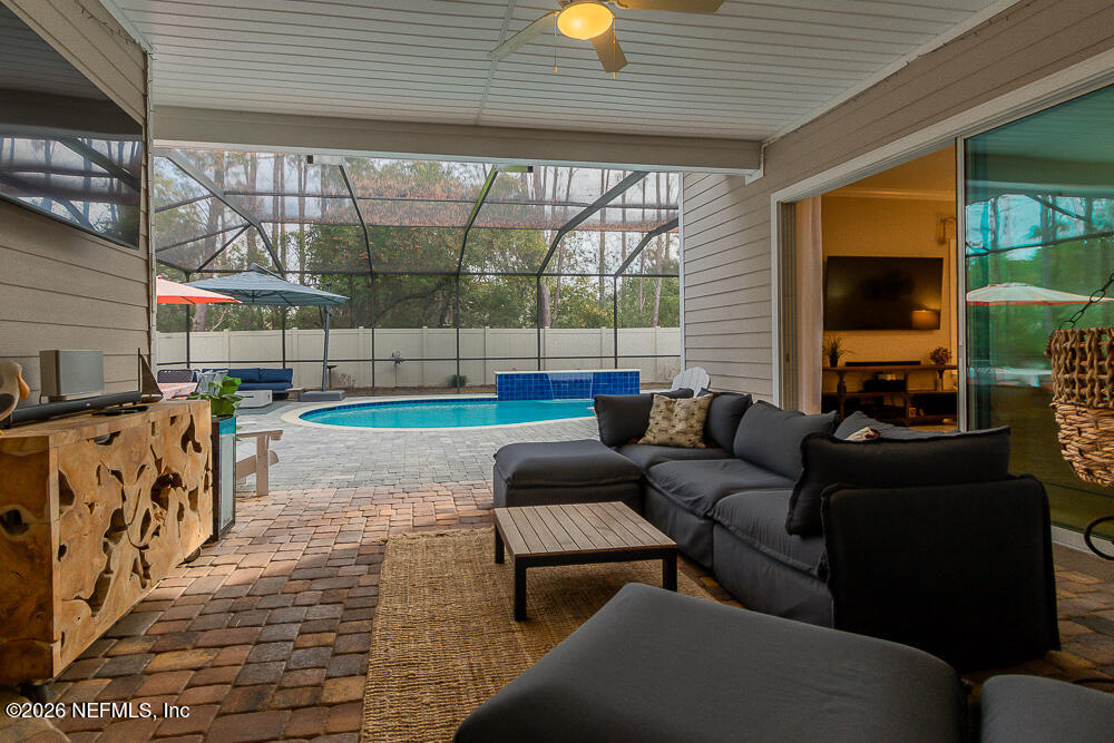 191 Enrede Lane St. Augustine, FL 32095 - Photo 40 of 44 a building outdoor space with patio furniture