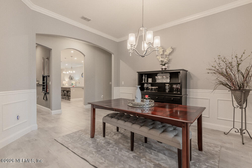 191 Enrede Lane St. Augustine, FL 32095 - Photo 5 of 44 a view of a room with furniture and chandelier