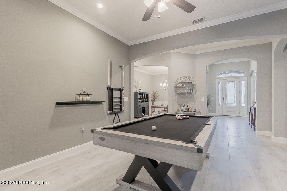 191 Enrede Lane St. Augustine, FL 32095 - Photo 9 of 44 a room with gym equipment and view of living room