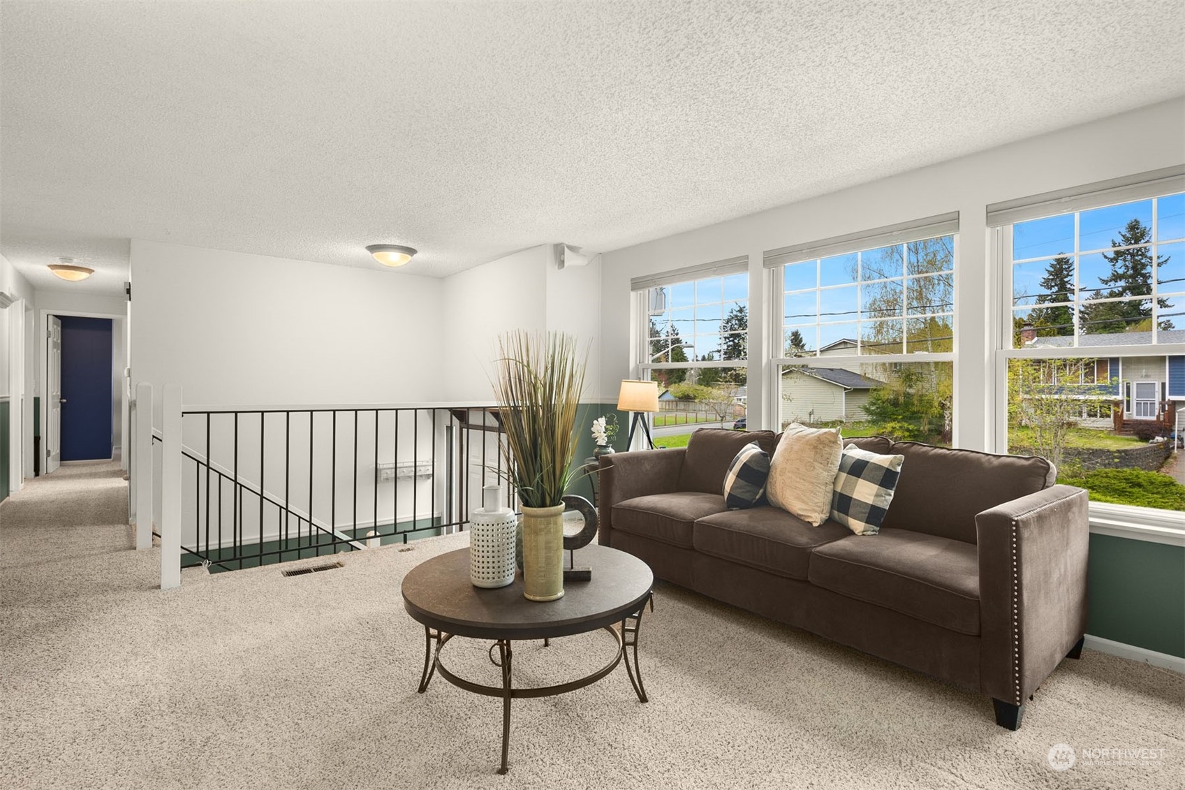 4409 Southeast 4th Street Renton, WA 98059 - Photo 4 of 39 a living room with furniture and a large window