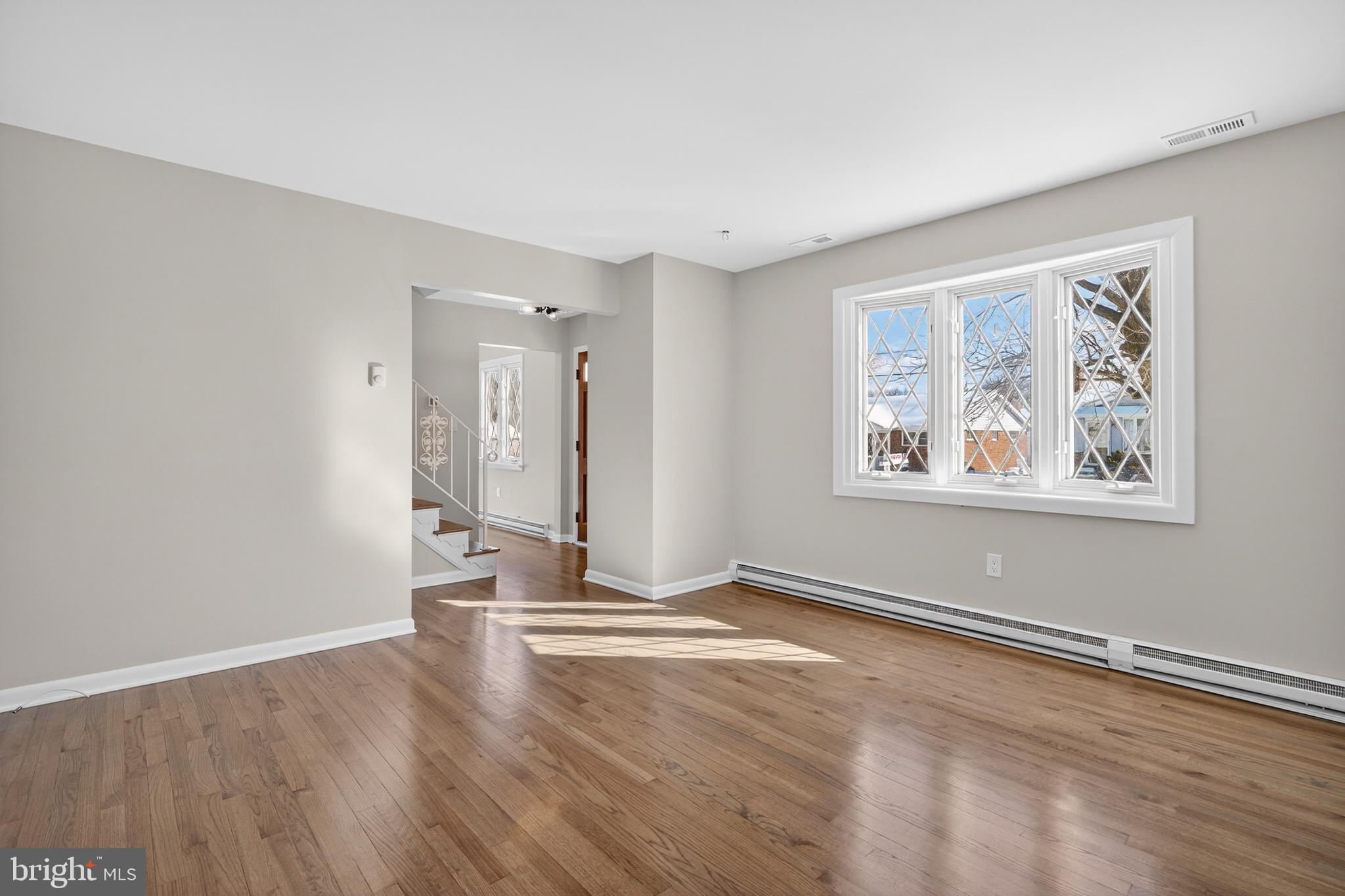 222 Chelsea Road Pasadena, MD 21122 - Photo 16 of 38 Living Room. To left is front door.