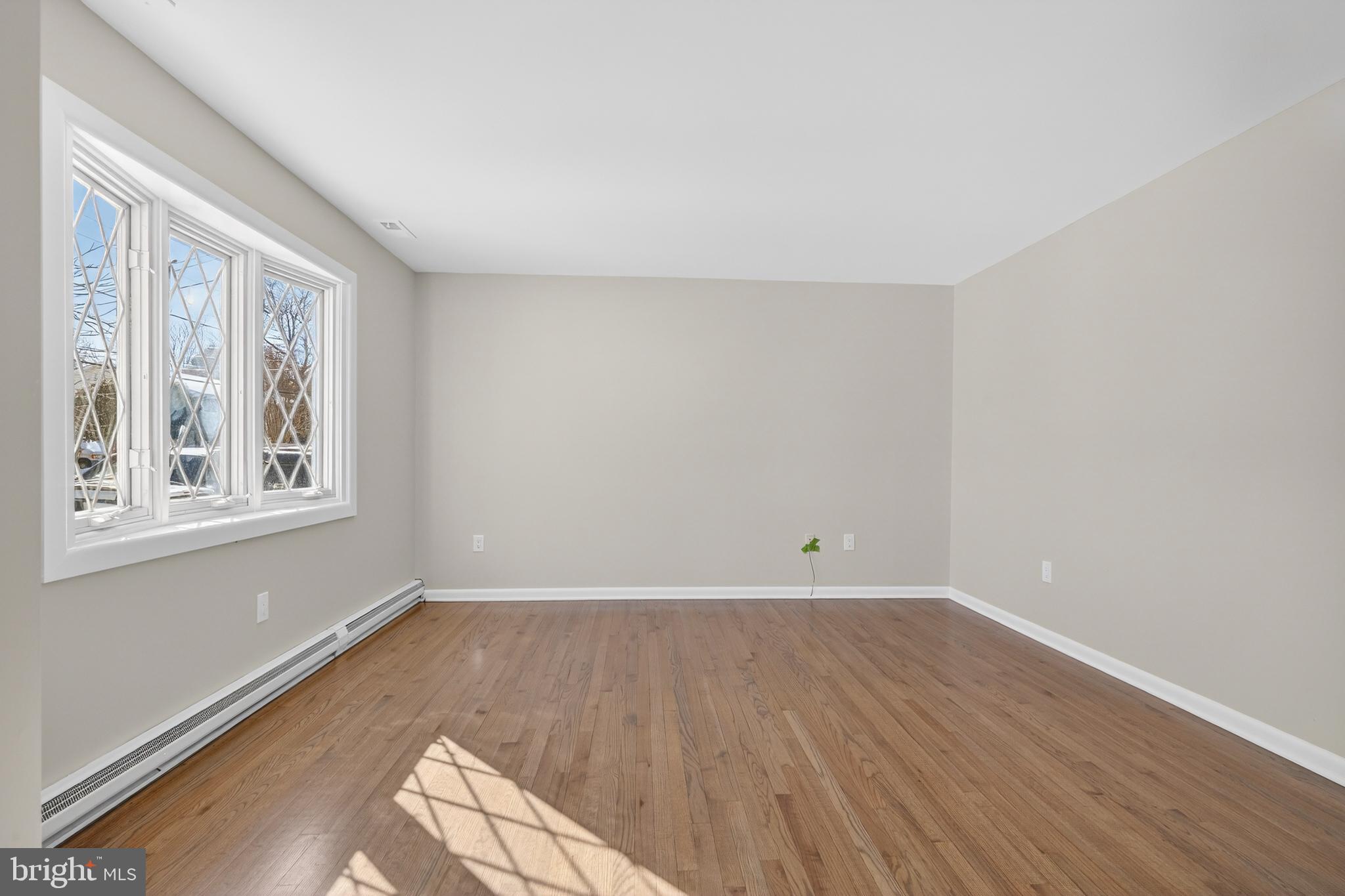 222 Chelsea Road Pasadena, MD 21122 - Photo 16 of 47 Living Room. Real solid oak 3/4 floor.