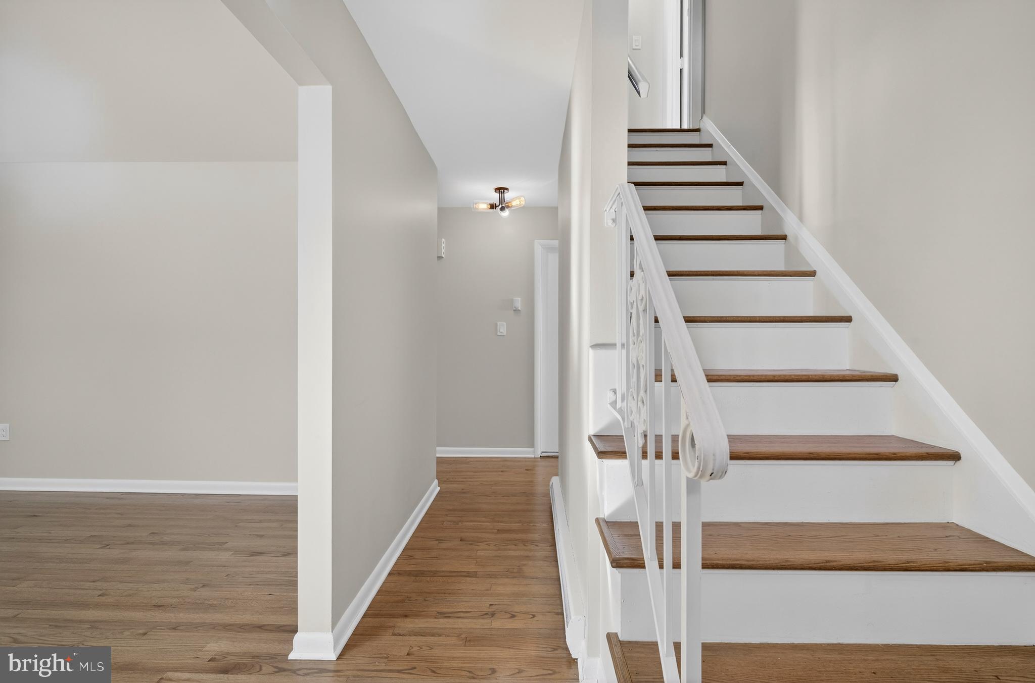222 Chelsea Road Pasadena, MD 21122 - Photo 20 of 47 Solid oak stairs to upstairs.