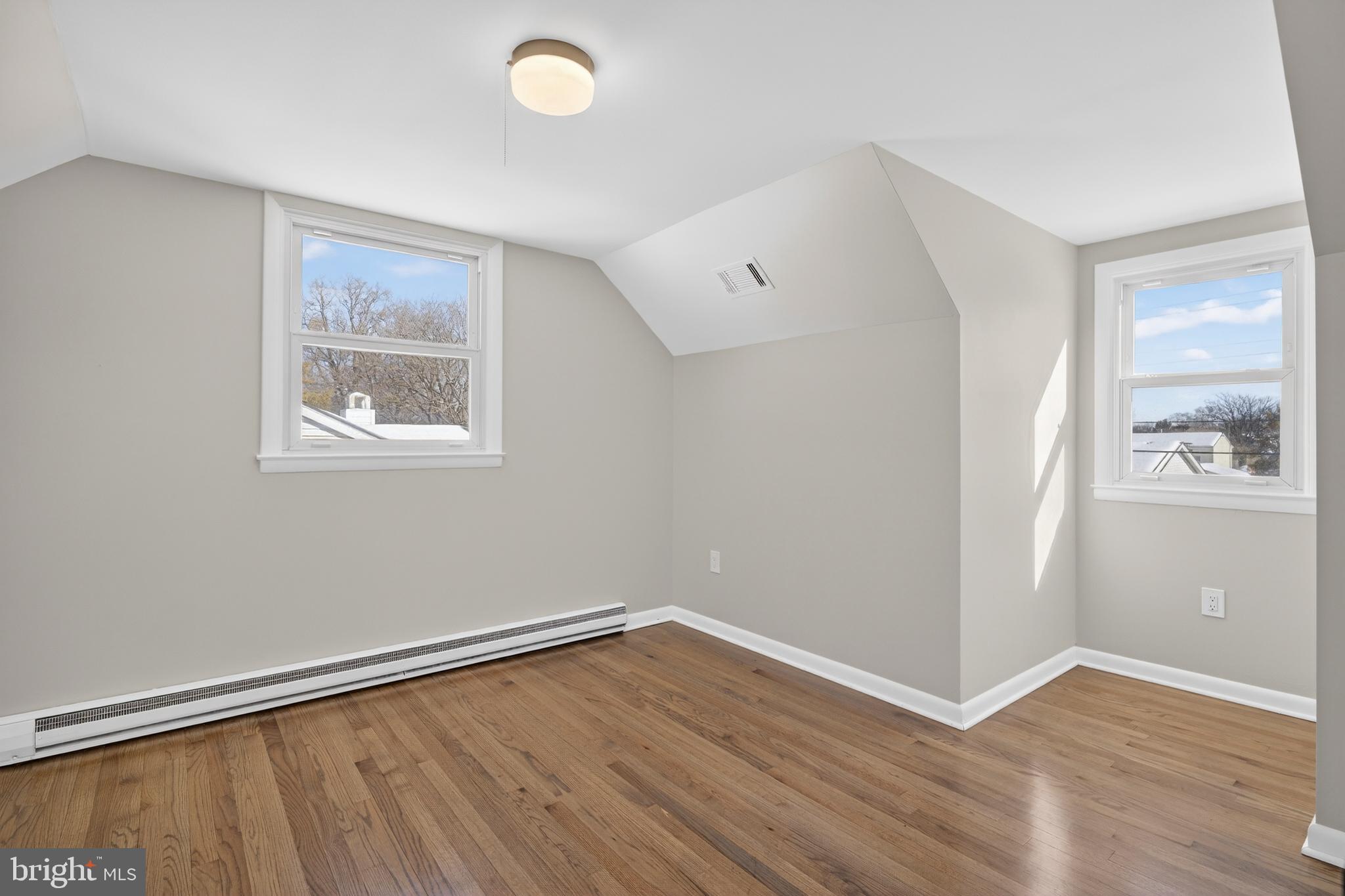 222 Chelsea Road Pasadena, MD 21122 - Photo 21 of 47 Upstairs. Bed #2. Oak floors, vaulted ceiling.