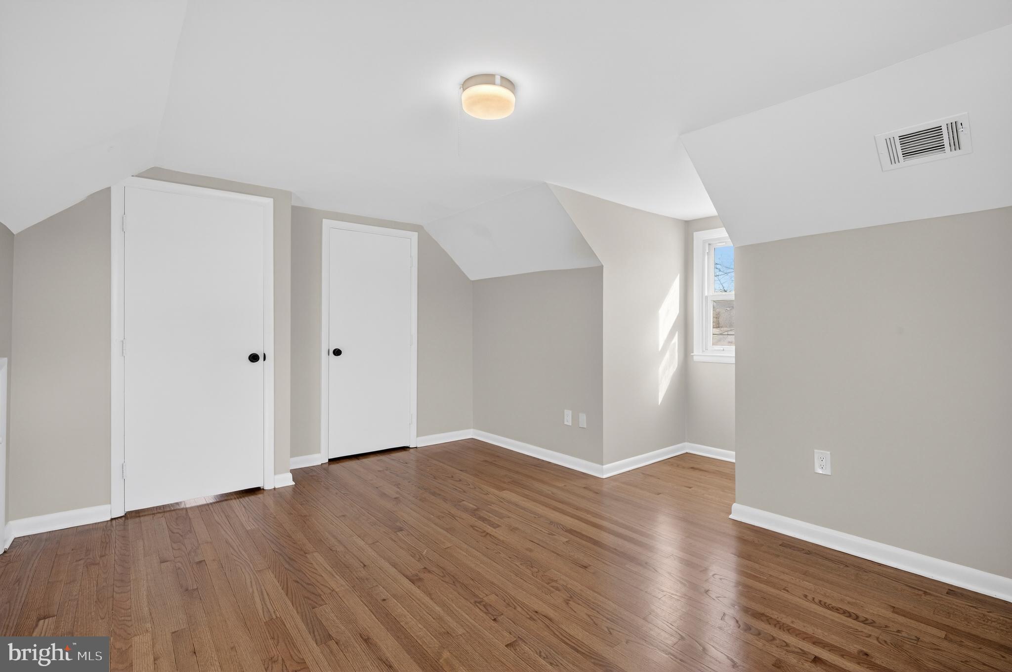222 Chelsea Road Pasadena, MD 21122 - Photo 26 of 38 Bedroom #3. Solid oak floors, vaulted ceiling.
