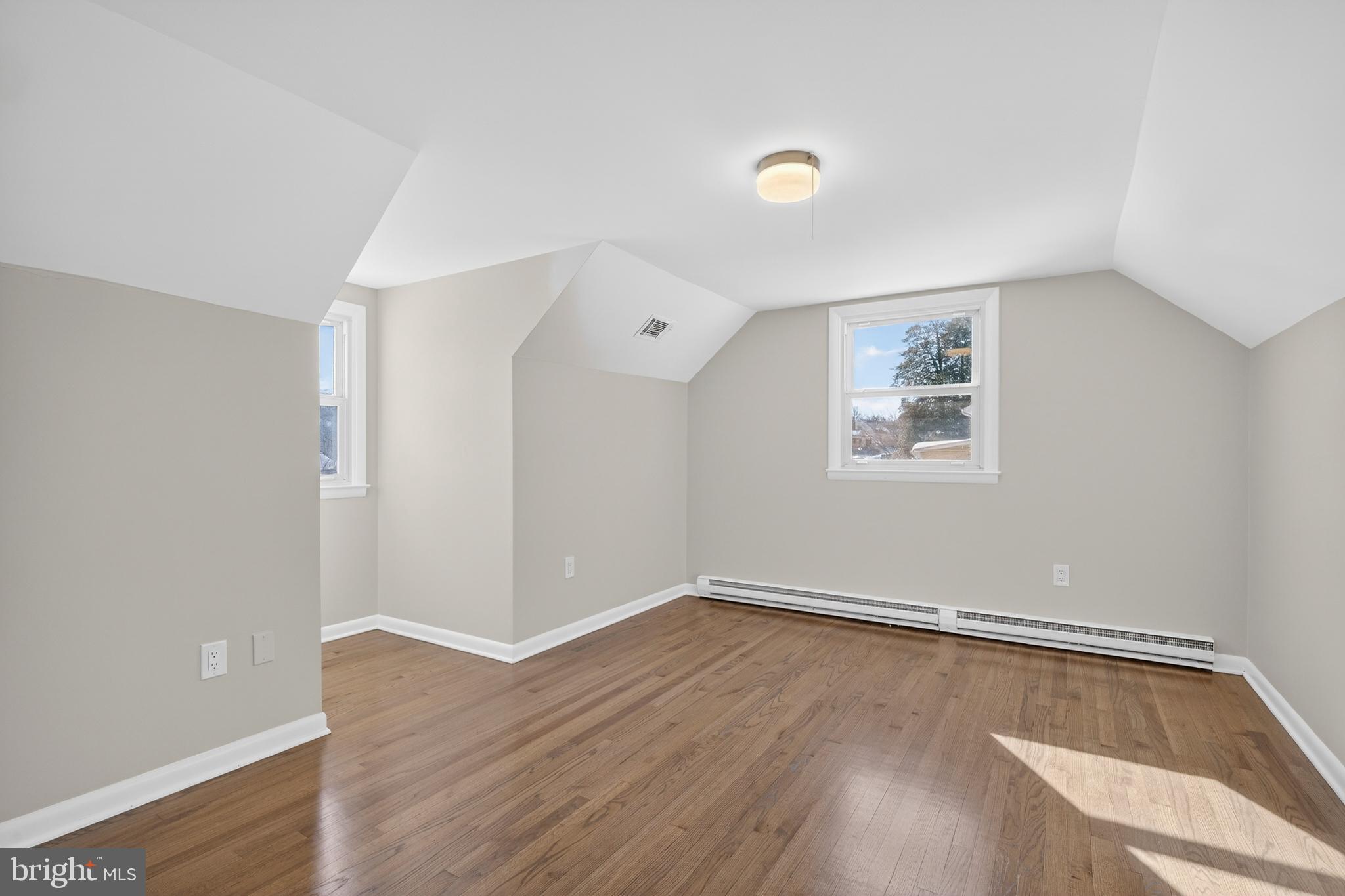 222 Chelsea Road Pasadena, MD 21122 - Photo 28 of 47 Bedroom #3. Solid oak floors, vaulted ceiling.
