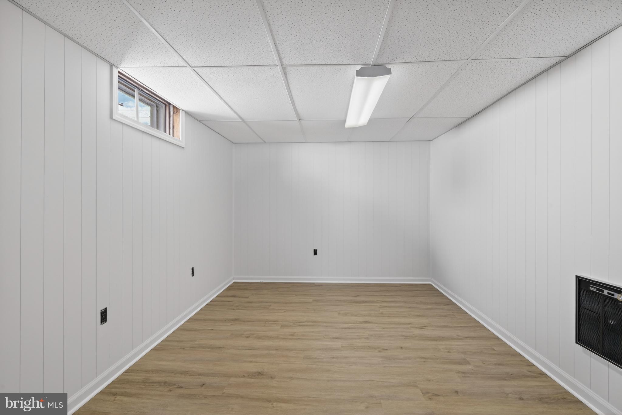 222 Chelsea Road Pasadena, MD 21122 - Photo 37 of 47 Basement, Bonus room New flooring. Repainted.