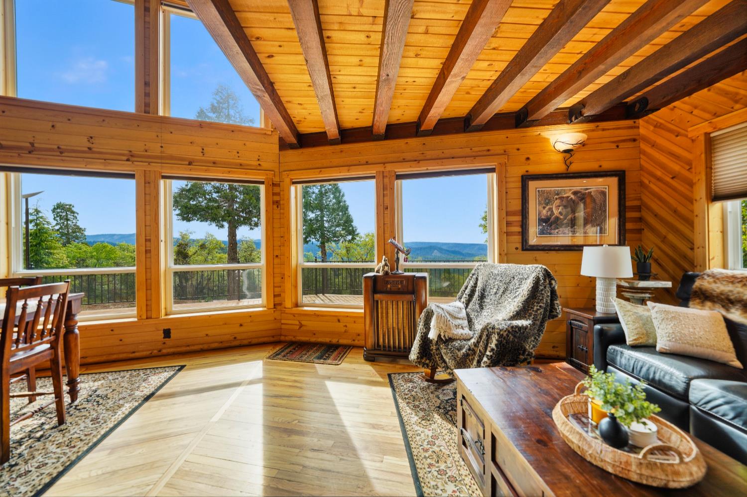 39000 Kearsarge Mill Road Alta, CA 95715 - Photo 10 of 65 a living room with furniture and a large window