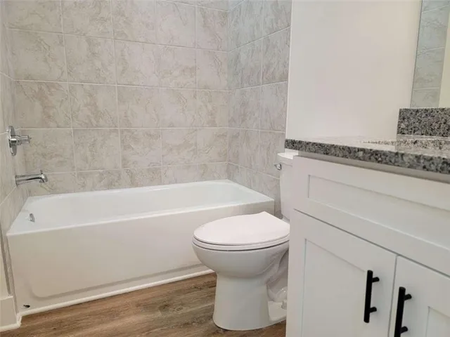 a bathroom with a sink and a bathtub
