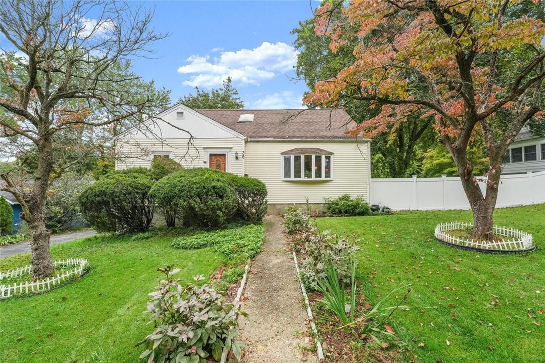 36 Heather Dell Road Ardsley, NY 10502 - Photo 1 of 1 a front view of a house with garden