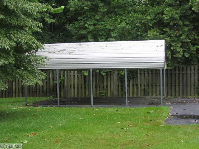 202 Rink Road Winston-Salem, NC 27107 - Photo 6 of 12 Exterior Back. Detached Carport