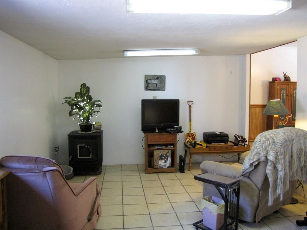 1400 Brimfield Road Warren, MA 01010 - Photo 7 of 17 a living room with furniture and a flat screen tv
