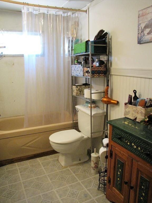 1400 Brimfield Road Warren, MA 01010 - Photo 10 of 17 a bathroom with a toilet a sink and a bathtub