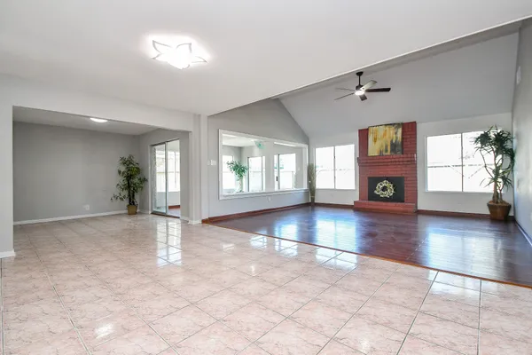 a view of a livingroom with furniture and a fireplace