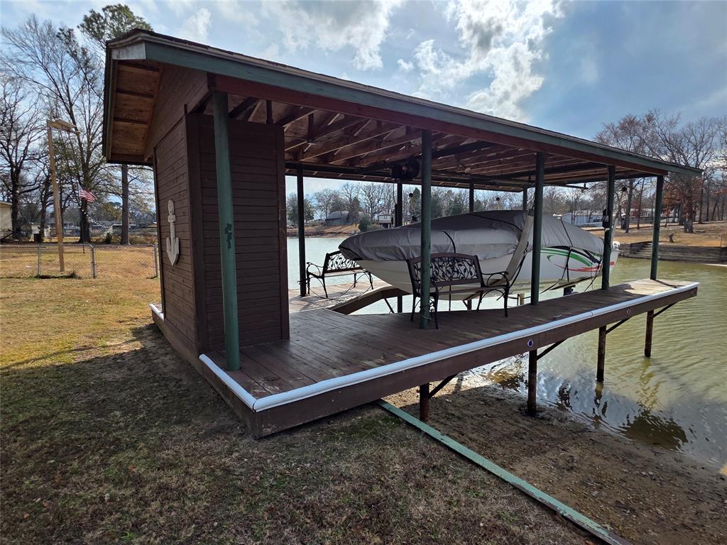 178 Indian Gap Road Mabank, TX 75156 - Photo 18 of 27 Dock with boat lift and a water view