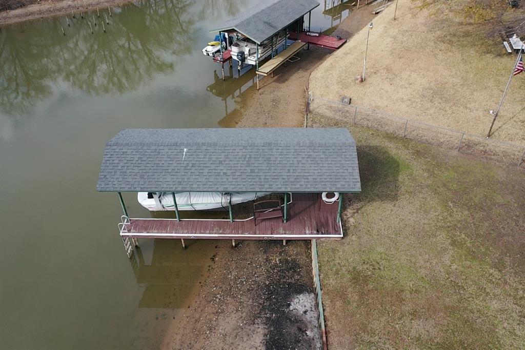 178 Indian Gap Road Mabank, TX 75156 - Photo 25 of 27 View of subject property with a nearby body of water