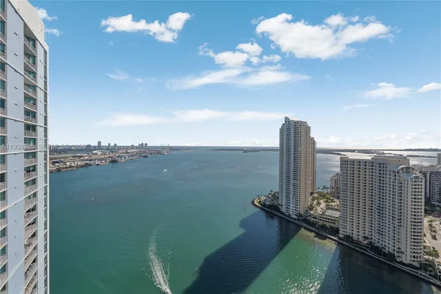 a view of a lake with a city