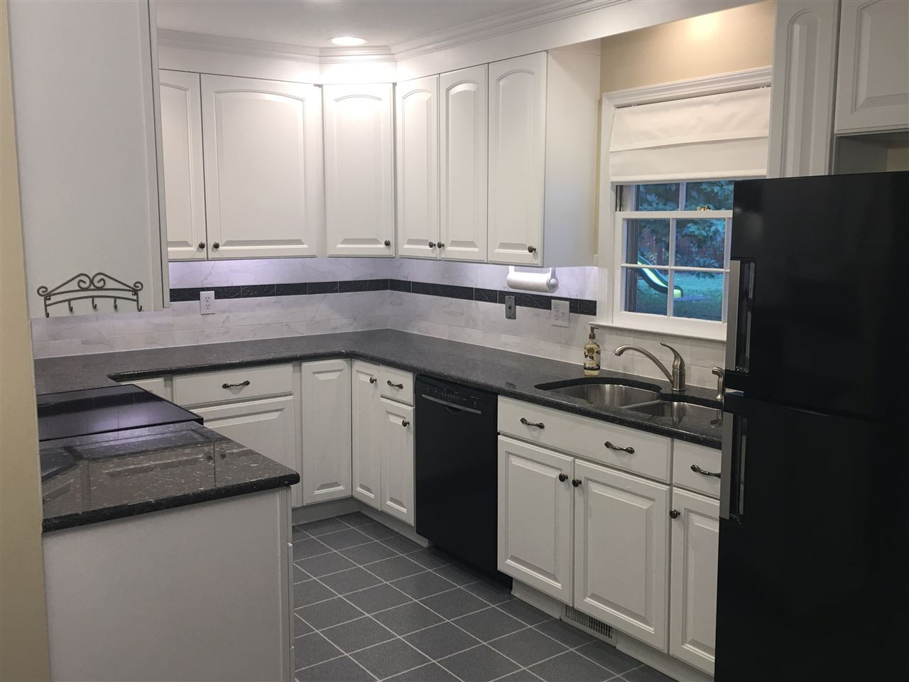 925 Pebblebrook Drive Raleigh, NC 27609 - Photo 6 of 23 Kitchen has granite counter tops, new Bosch Dishwasher