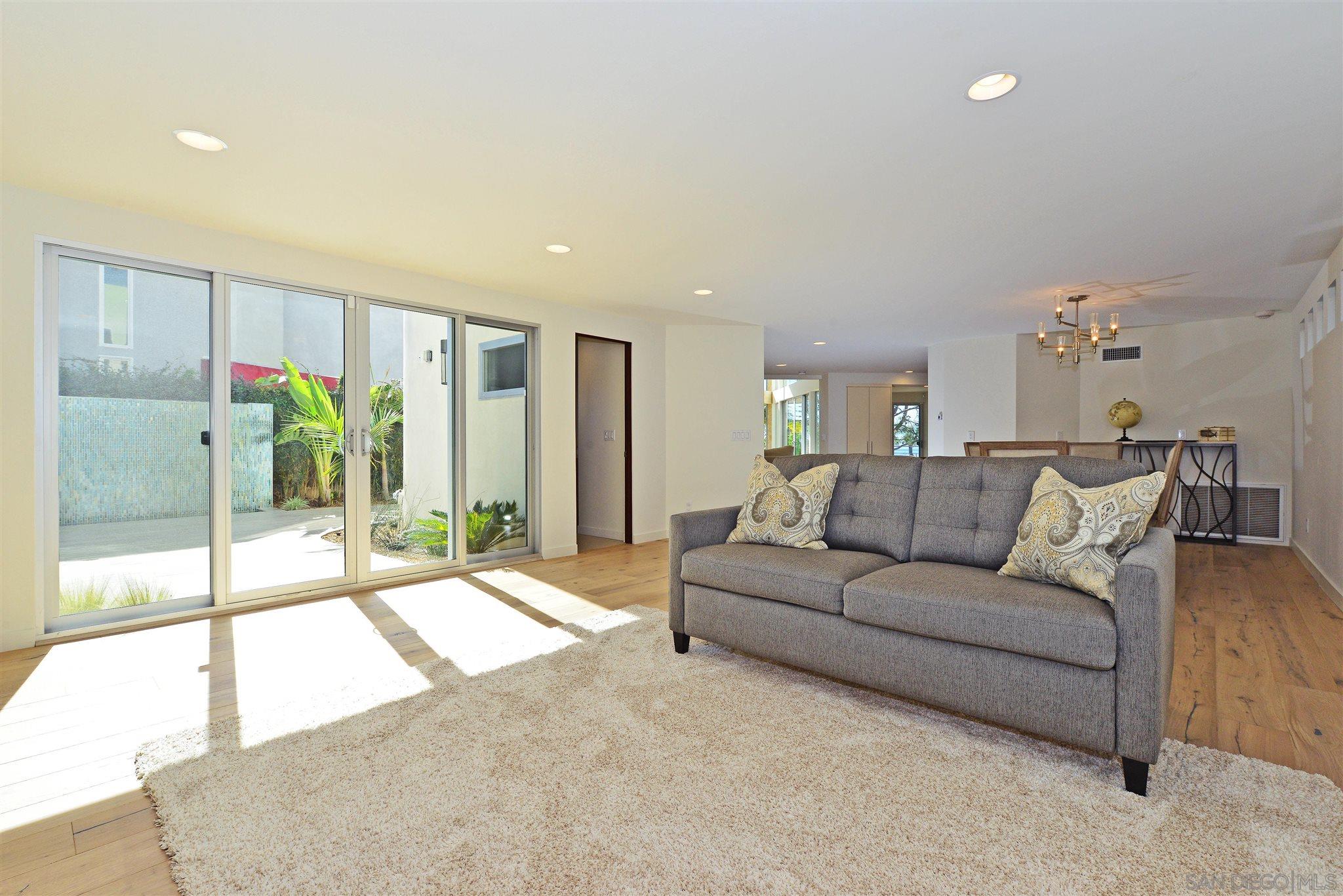 13721 Pine Needles Drive Del Mar, CA 92014 - Photo 15 of 32 a living room with a large window