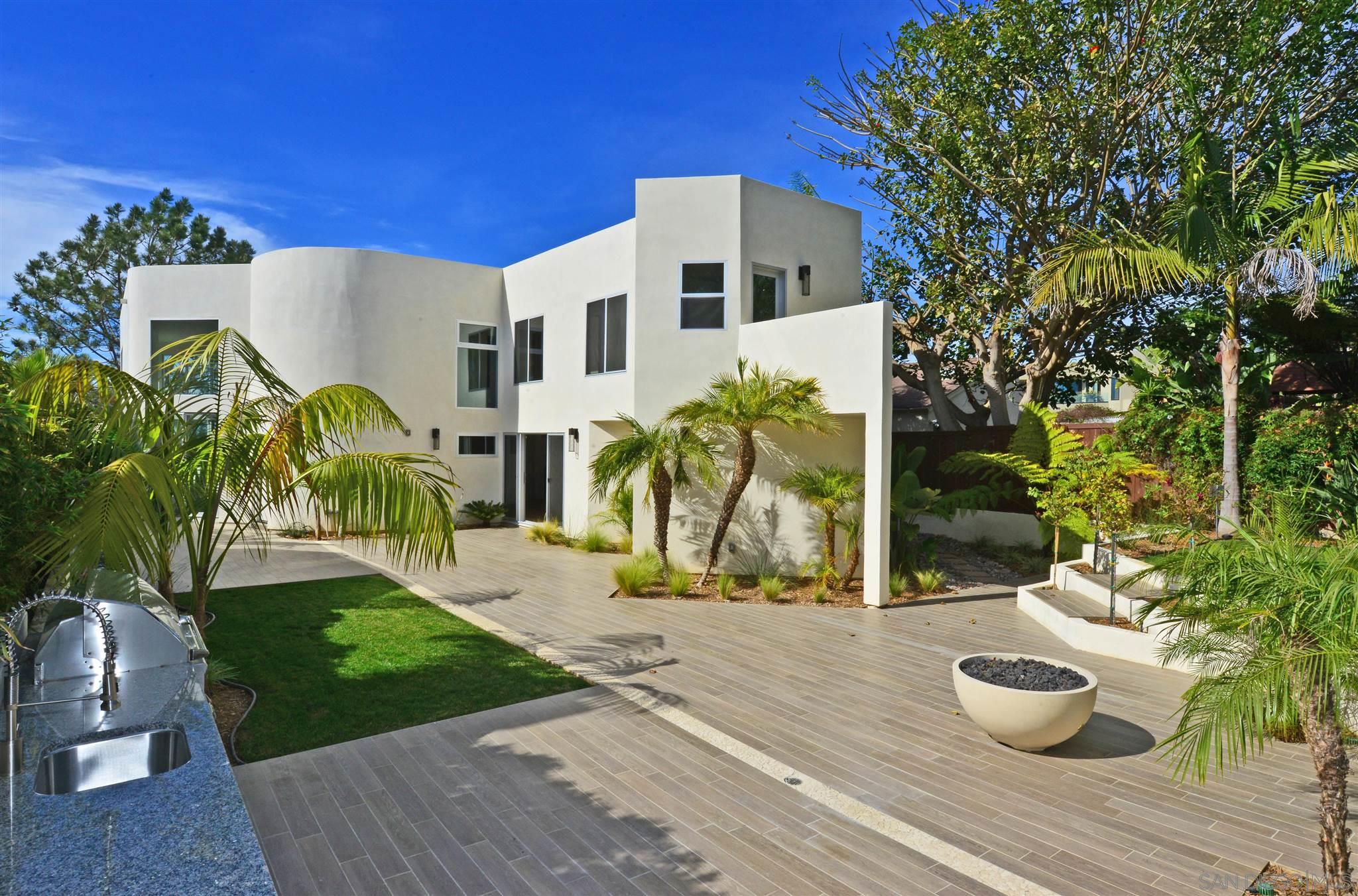 13721 Pine Needles Drive Del Mar, CA 92014 - Photo 28 of 32 a front view of house with yard and seating area